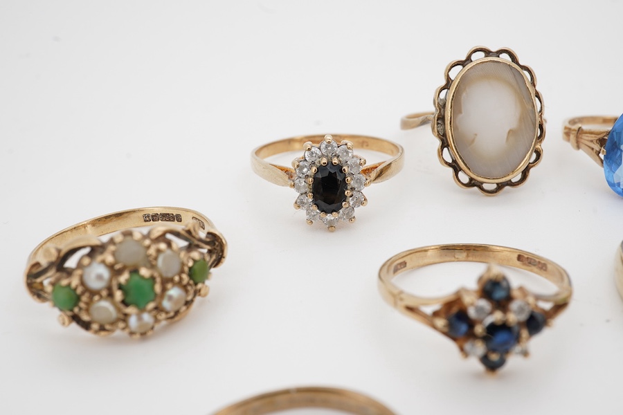 A group of assorted modern 9ct and gem set rings including opal and seed pearl and turquoise and one other 10k ring. Condition - fair to good